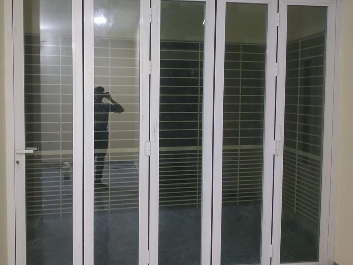 White aluminium folding door, our installation